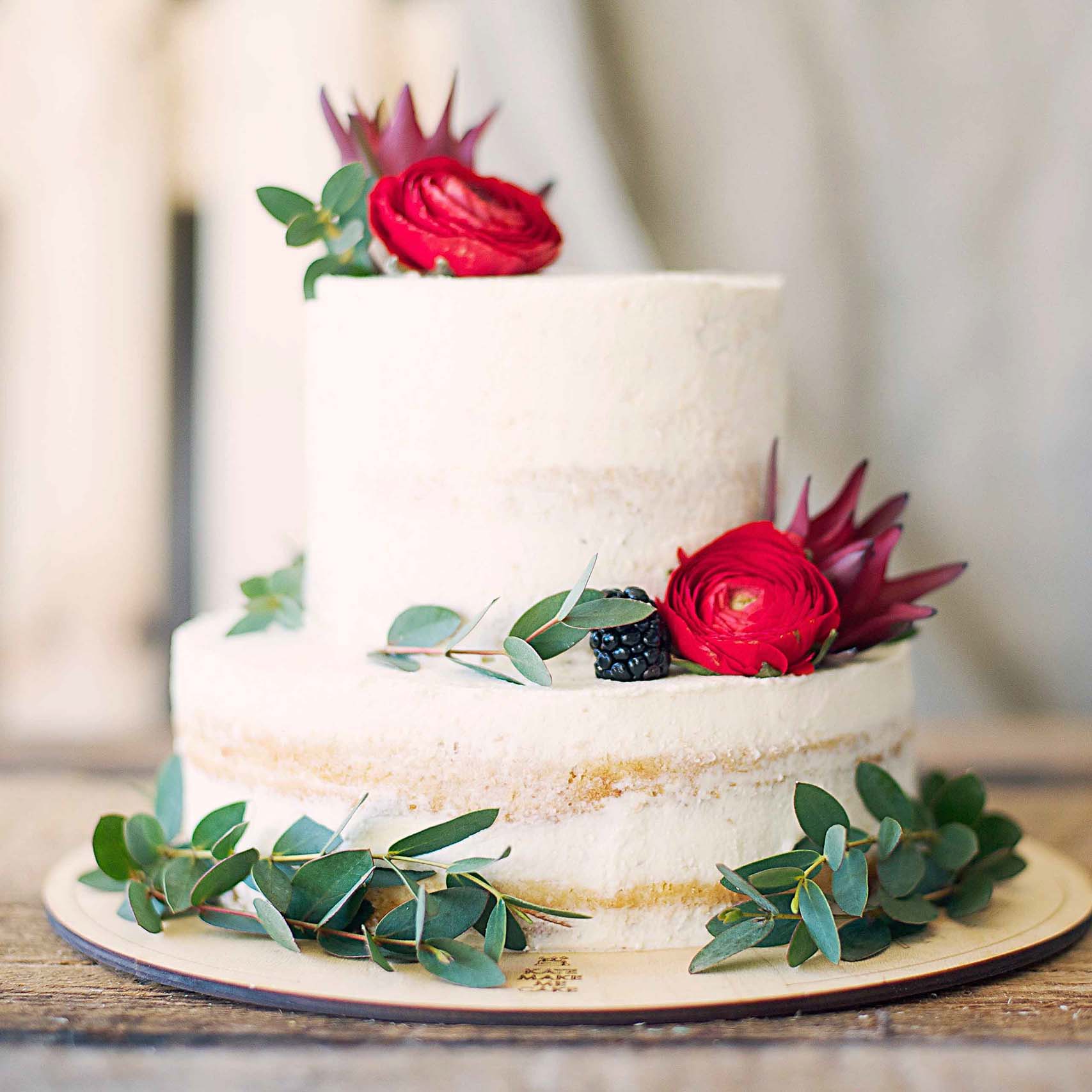 white cake with flower decoration